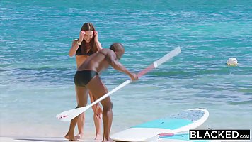 Brunette with elastic ass fucking with a muscular black man at the resort